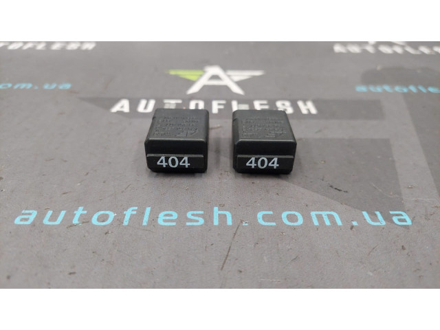 Реле 404 багатофункціональний 7M0951253C Audi Seat Skoda Volkswagen бу
